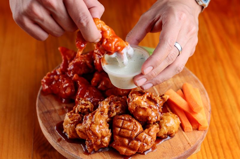 Buffalo Chicken Wrap with blue cheese drizzle